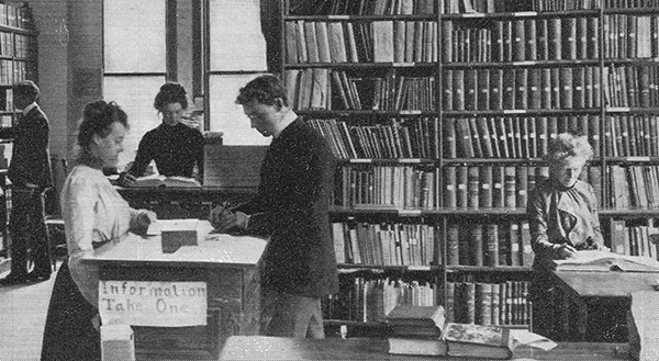 Photo of people inside the Cook Hall library