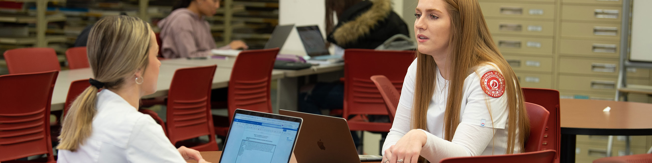 Students studying in open study space