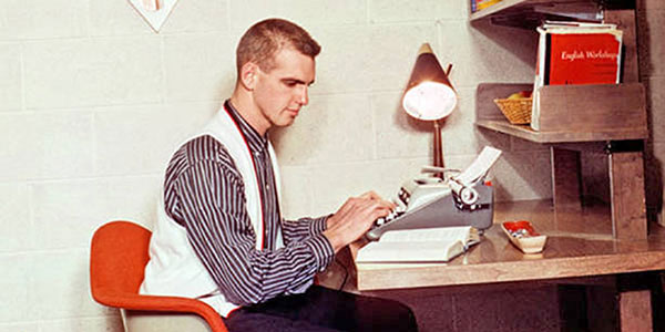 photo of a student using a typewriter