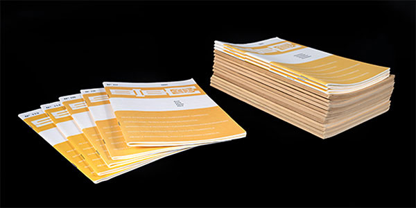 photo of stacked journals