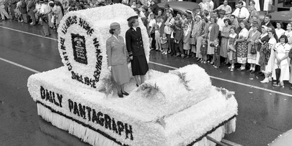 Centennial Parade with Daily Pantagraph float and uniformed women soldiers, Bloomington, Illinois, September 20, 1950