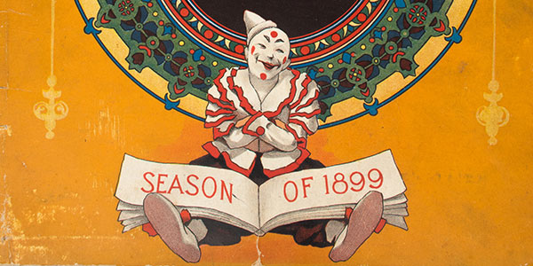 illustration of a clown holding a book that says 'Season of 1899'