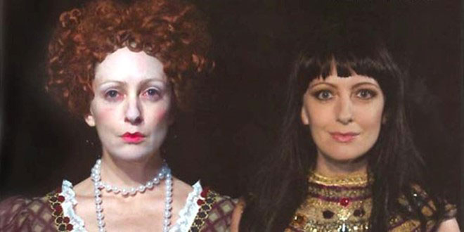photo of two people in stage makeup and costume