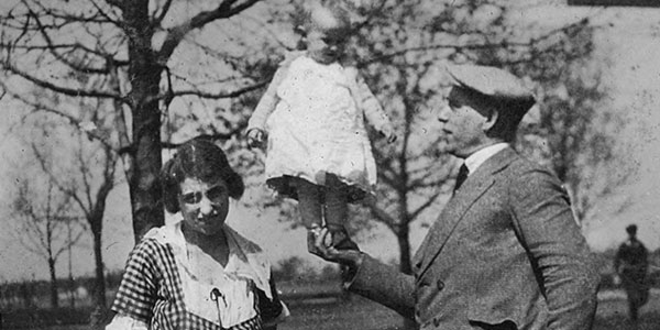 Anthony Patt his balancing daughter Charlotte in his hand as wife Vera (Musselman) Patt stands nearby. Tony and Vera together formed the trapeze act the Aerial Patts. Tony died in 1928 and Vera later remarried to a man named Frank Keeler, who performed under the stage name Frank Zerado or Prof. Zerado. They continued to tour as the Patt-Zerado troupe for several years. Charlotte also had a short career as an aerialist; the entertainment industry periodical The Billboard reports her performing with Barney Bros. Circus in 1937. 