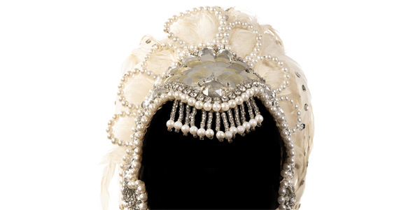 cream and silver costume headgear