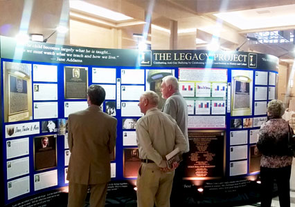 Visitors viewing the Legacy Wall