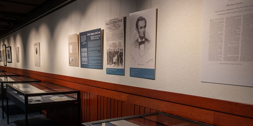 Posters and artifacts from the exhibit on display in Milner Library