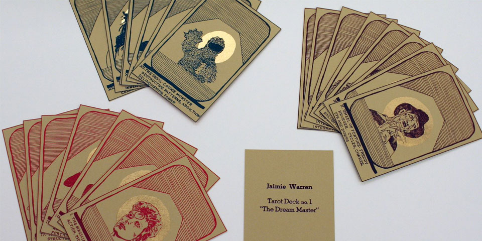 Tarot deck on brown paper with illustrations of pop-culture figures