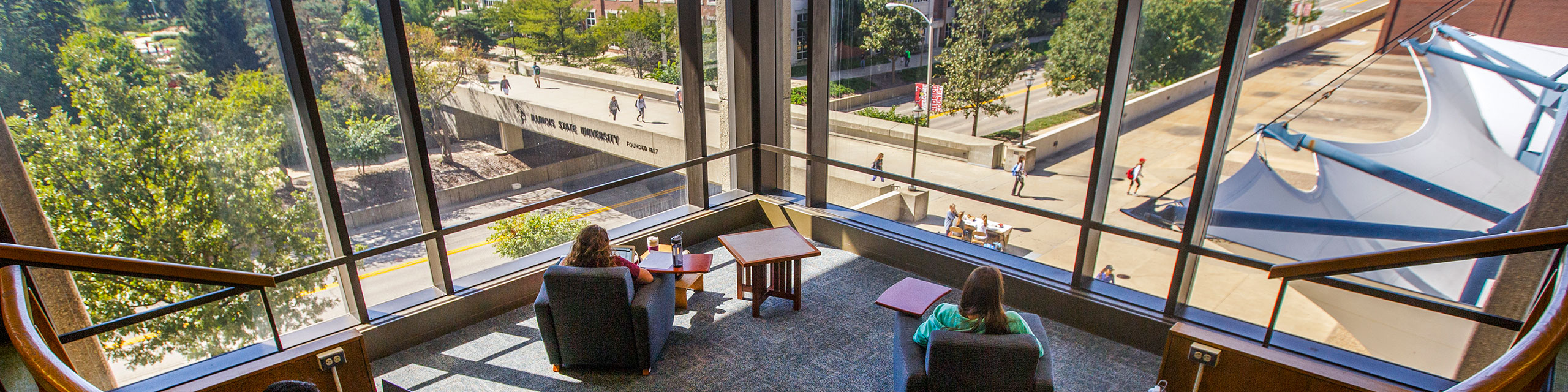 The view from the library captures ISU bridge with students in the background.